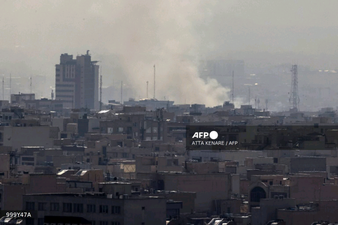 AFP__20260228__999Y47A__v1__Mockup__IranIsraelUsConflict-1536x1024