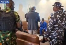 BREAKING: MC Oluomo escorted by soldiers, policemen as he regains control of NURTW national secretariat