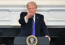 Oil surges, global stocks fall as Trump escalates Iran threats